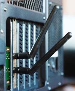 Network card antennas peering through computer case